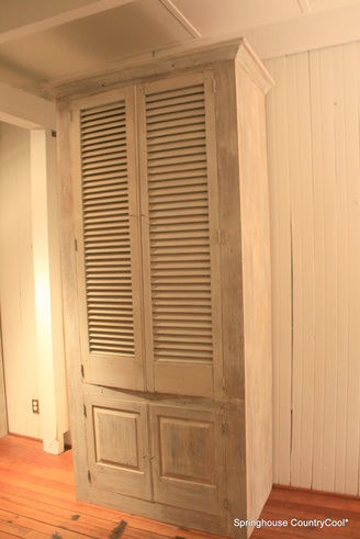 Custom Cabinet handcrafted from reclaimed wood and shutter.s milk painted grey shutter cupboard